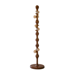 A tall, narrow wooden floor lamp with a glossy brown finish, featuring a wavy vertical shaft, a round base, and several clear glass globe bulbs with gold-toned caps.