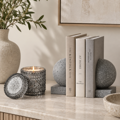 Monolith Concrete Bookends  along with Night Jasmine Fragrance Trinket Jar Candle on a marble surface