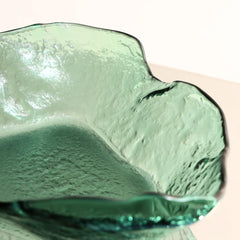 Close-up of Moss Green glass lava bowl with textured design