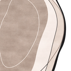 Close-up of a textured surface with circular patterns in beige and black.