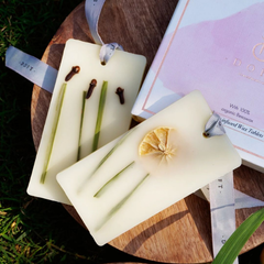 Lemon Grass & Clove Wax Tablet - Set of 2, close-up of tablets with cloves, lemongrass and dried lemon