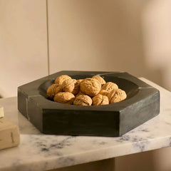 Hexagon Black Marble Bowl - Filled with Walnuts on White Marble Table