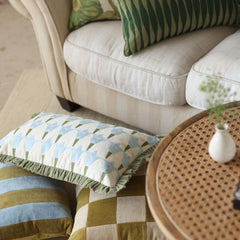 Image of a Tulip Light Blue Oblong Cushion Cover and contains table