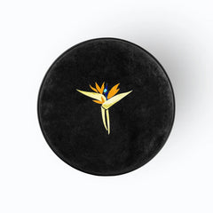 Bird of Paradise - Walnut, top view of round black marble tabletop with bird of paradise stone inlay