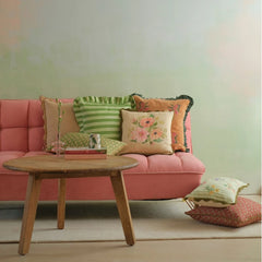 Annabella Amber Linen Cushion Cover in living room with sofa and coffee table, wide view
