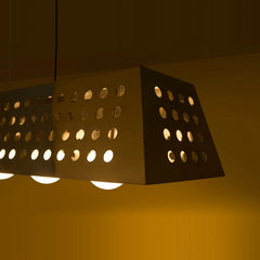 Obscura Chandelier Light lit, low angle view of perforated metal side panels