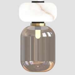 Close look of alabaster pendant light with glass shade and white marble-like top