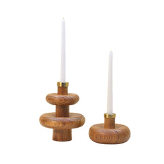 Two wooden different size Warm Wave Candle Holders with candles on a white background