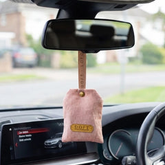 Car Freshener - Scented Sacks - Tuberose Orchid & Lemongrass - Set of 2, pink sachet hanging from a car rear-view mirror