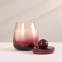 Cosmic Hues - Lid Jar Candle | Purple | Opulent Oud, lit plum ombre glass jar with bell lid set beside it