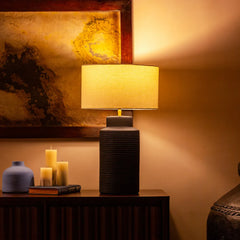 Decorative Jasper Table Lamp on a table with warm glow in dark