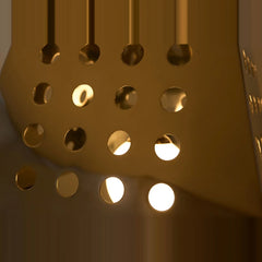 Obscura Chandelier Light close-up of glowing circular cut-outs in perforated metal
