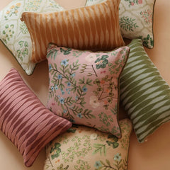A set of six decorative multi color Eden Rose Linen Cushion Covers in various colors and patterns, including stripes and floral prints.