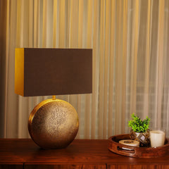 Decorative Brillo Table Lamp with a brown fabric shade and aluminium lamp base in a radiant gold finish