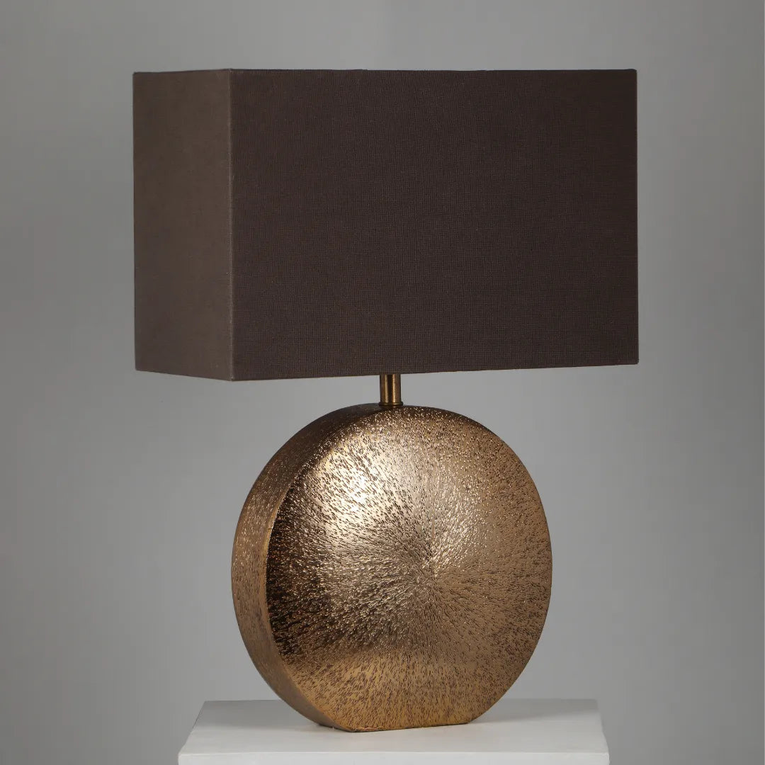 Brillo Table lamp with aluminium bronze base and dark brown shade on a gray background