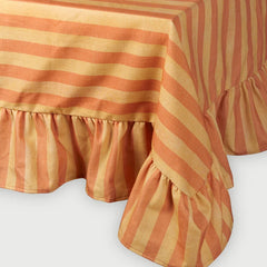 Linea Ruffle Amber Cotton Table Cover corner drape with striped ruffle hem