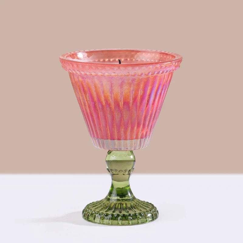 Sundae Votive Candle - Petal · Berry Blonde, pink iridescent ribbed glass on green pedestal stem, front view