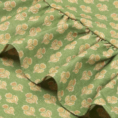 Viola Ruffle Forest Green Cotton Table Cover close-up of floral buti print and cotton duck ruffle