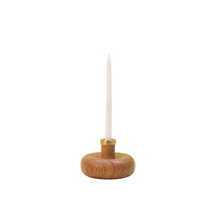 Warm Wave Candle Holder with teak wood base, brass top with white candle on a white background