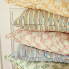 Echo Rose Cushion Cover styled on a sofa