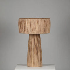 Wooden Fiume Table Lamp with natural raffia, combining robust construction with organic texture.