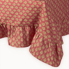 Viola Ruffle Carmine Cotton Table Cover corner drape showing ruffled hem
