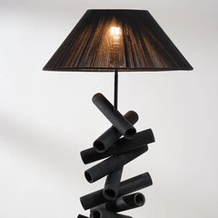 Modern black floor lamp with a unique design and lampshade