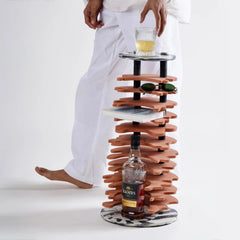 Modern wine rack with a bottle and glasses on a white background