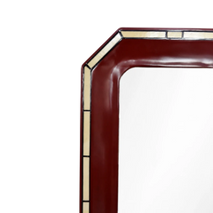 Orvane Wall Mirror close-up of top left corner showing glossy maroon frame and tile border