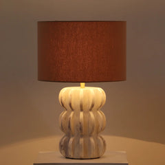Spar Table Lamp with textured base and brown shade on a neutral background