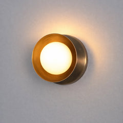 Dew wall-mounted light in brass dome shade fixture