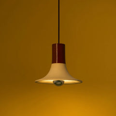 Wine Pendant Light lit, cream ceramic flared shade with glossy burgundy neck, close-up