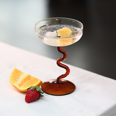 Swirl Cocktail Glass with playful stem in amber, handmade, perfect for cocktails, decor, or gifting
