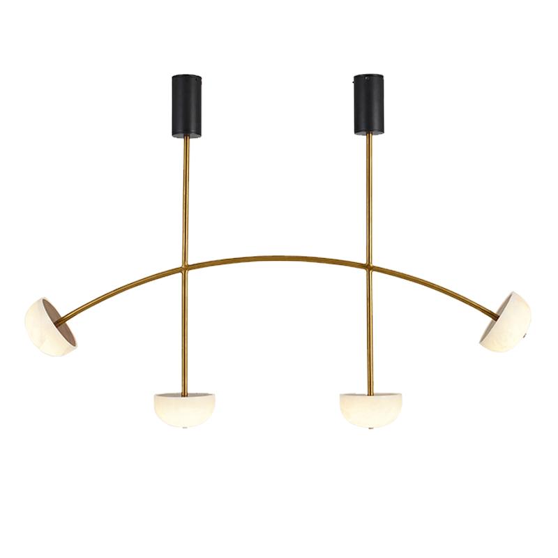 A gold-colored chandelier with a curved structure featuring four light fixtures, each topped with a white alabaster-like material.