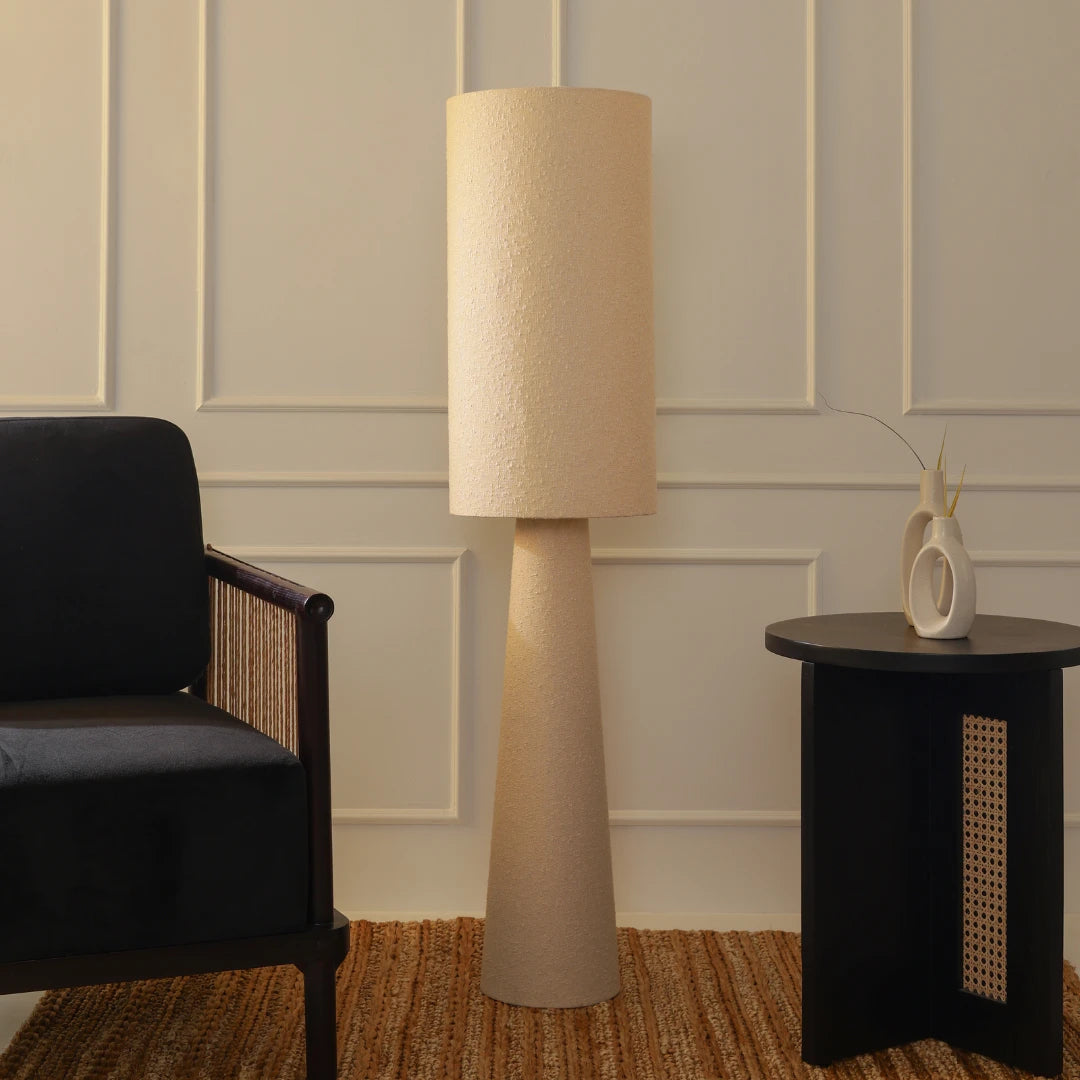 Oslo Floor Lamp full view showing its sturdy metal frame and boucle lampshade
