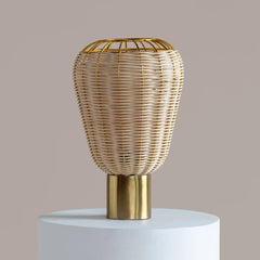 Decorative Meiji Table Lamp with woven design and gold base on a neutral background