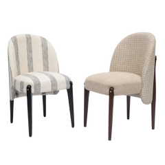 Two upholstered chairs with striped pattern and four legs
