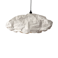 Cloud-shaped white pendant light on a white background