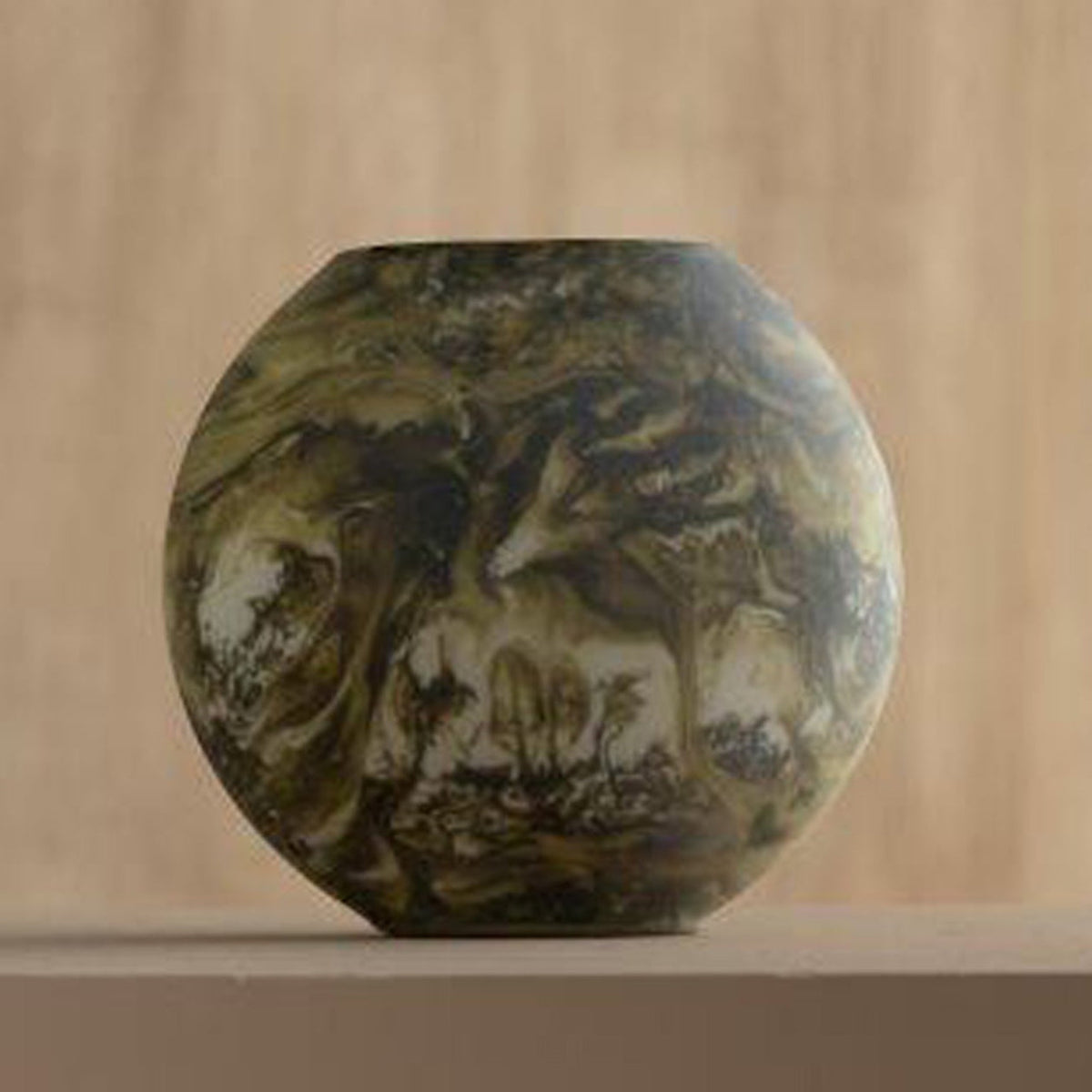 Decorative Bella Green Vase with artistic design on a beige background