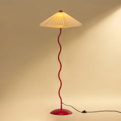 Wavy Floor lamp with a red base and curved rod 