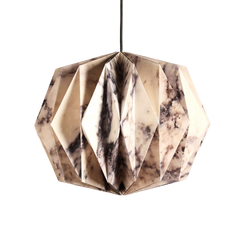 A sphere pendant lamp with a marble print design, made of paper, displayed against a neutral background