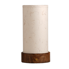 A modern table lamp with a white paper lantern-like shade on a mango wood base, featuring a touch sensor on the base for operation.
