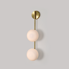 closer look of Link Wall Sconce, singular arm with two glass globes
