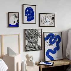 Modern interior with framed abstract art print on a wall