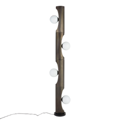 A floor lamp with a black plated steel base and opal glass globe lights.