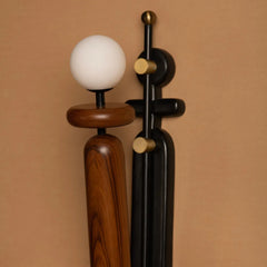 Decorative Dash & Dot Wall Sconce with wooden and metal design on a beige background