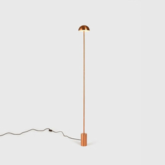 Modern floor lamp with Mushroom style shade and metallic finish