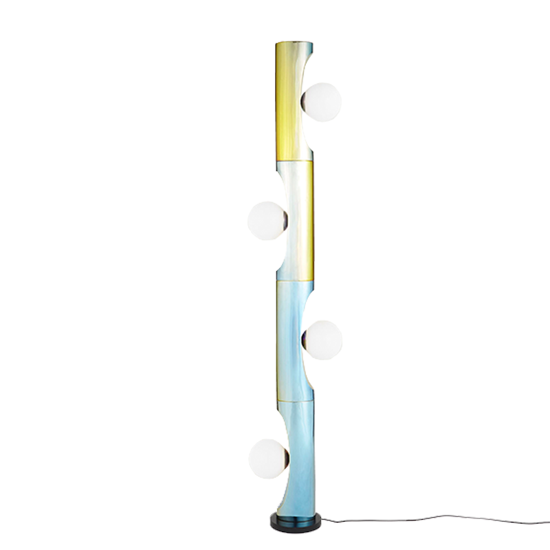 A floor lamp with a rainbow-colored design, featuring a series of round opal glass pieces mounted on a plated steel pole.