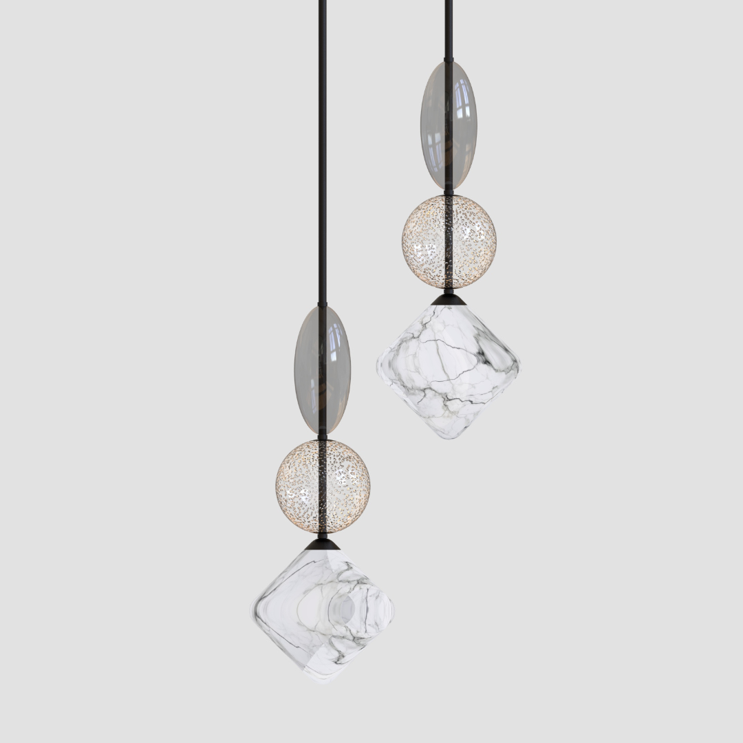 A set of contemporary pendant ceiling lights with geometric glass shades in white and transparent colors, suspended from a steel frame.
