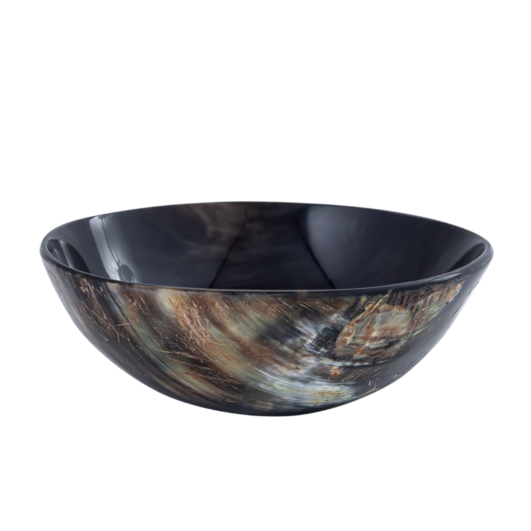 A small, round, beige and dark brown swirl pattern Bohor horn bowl.